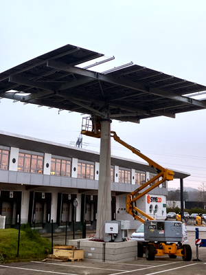 Installation of the solar tracker by crane and other equipment.